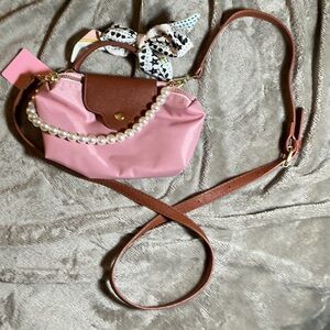 Pink Crossbody Bag with Pearl Handle and Brown Flap